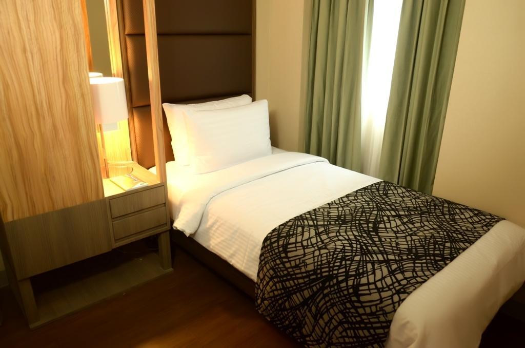 Best Western Antel Spa Hotel Suites Макати Номер фото