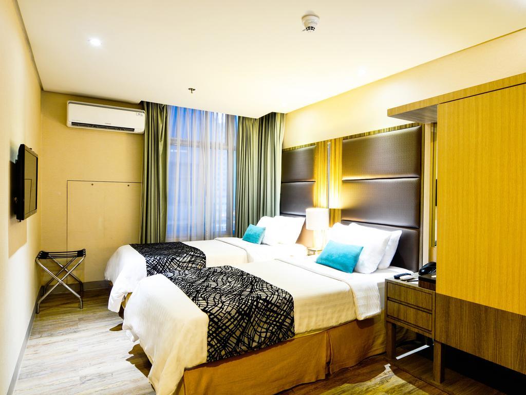Best Western Antel Spa Hotel Suites Макати Номер фото